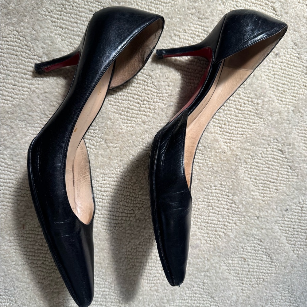 Louboutin pumps- re-soled but still beautiful